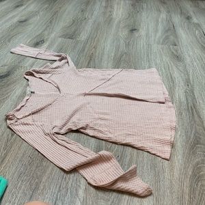 A cute light pink sweater.